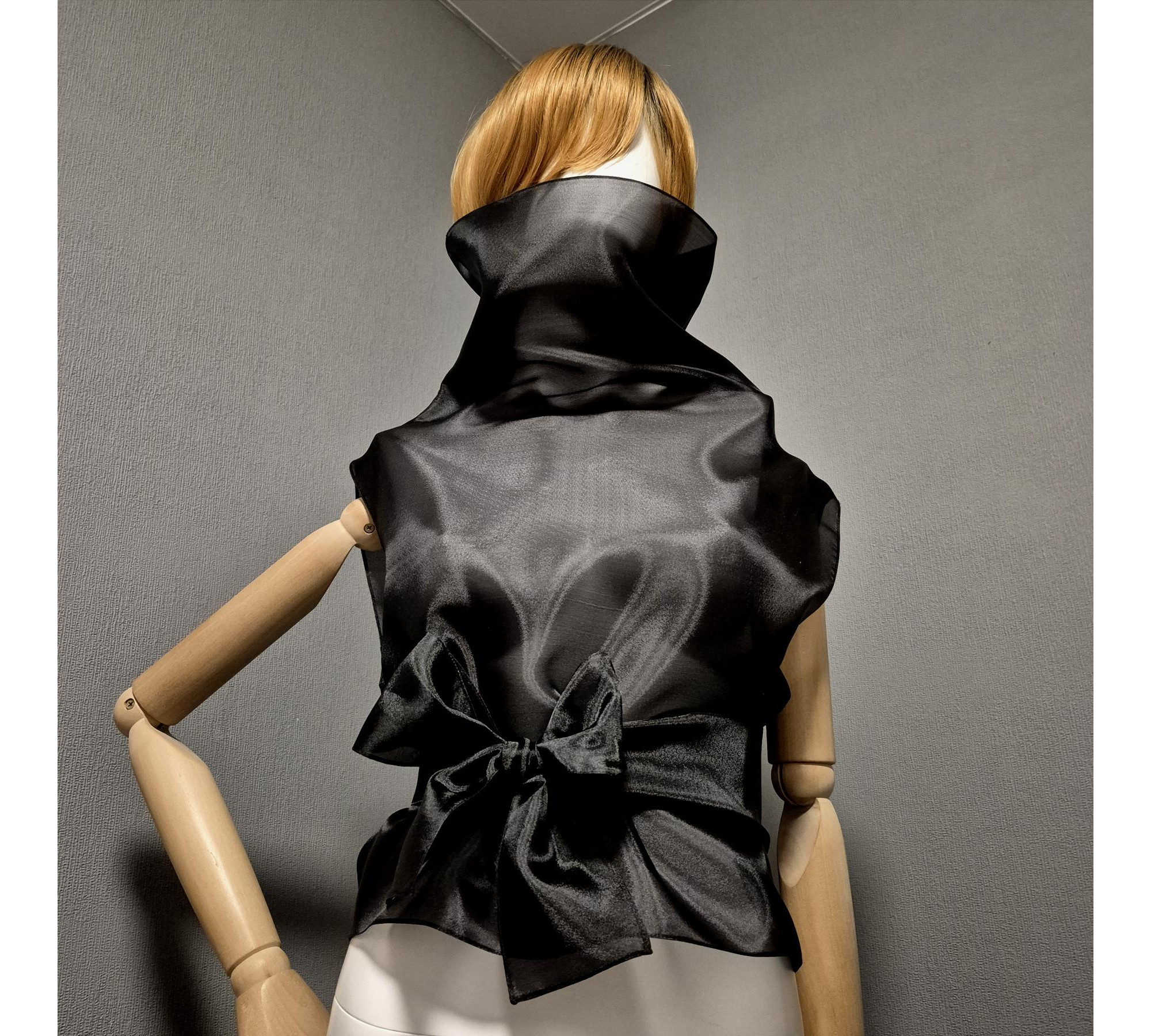 Black gothic style belted blouse a high neck, made of translucent organza.