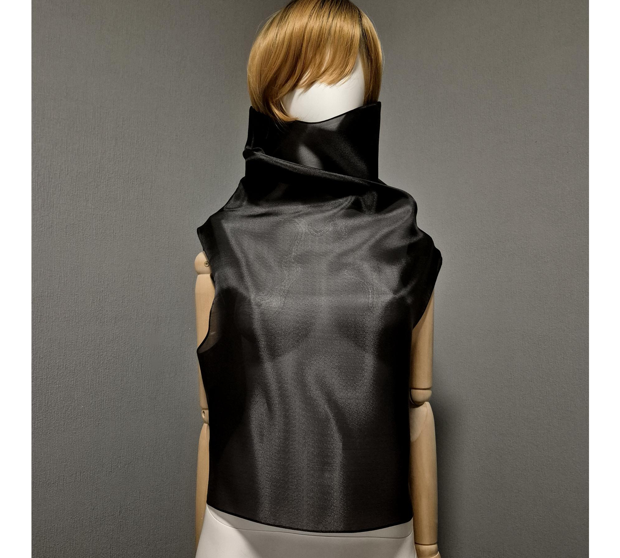 Black gothic style belted blouse a high neck, made of translucent organza.