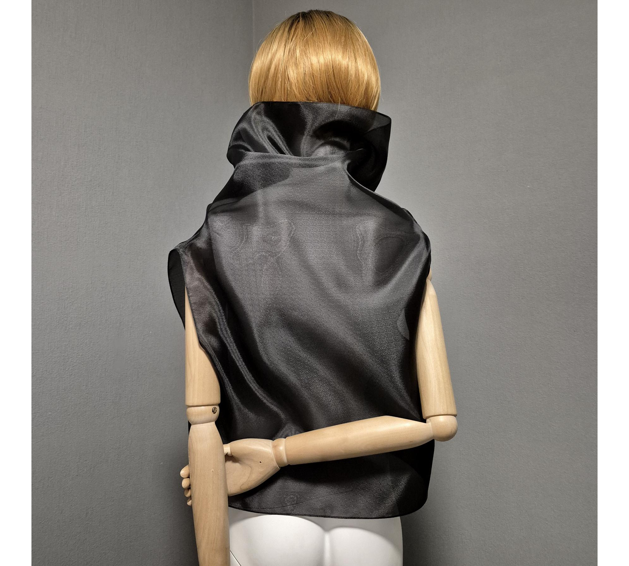 Black gothic style belted blouse a high neck, made of translucent organza.