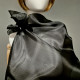 Black gothic style belted blouse a high neck, made of translucent organza.