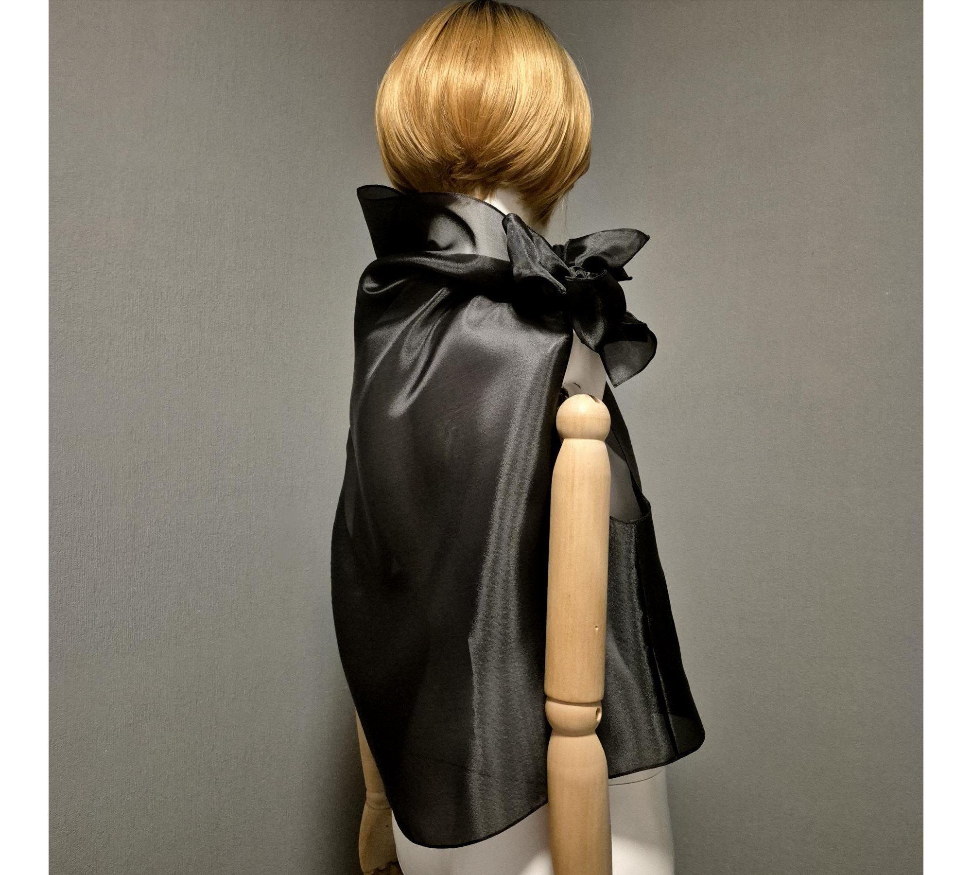 Black gothic style belted blouse a high neck, made of translucent organza.