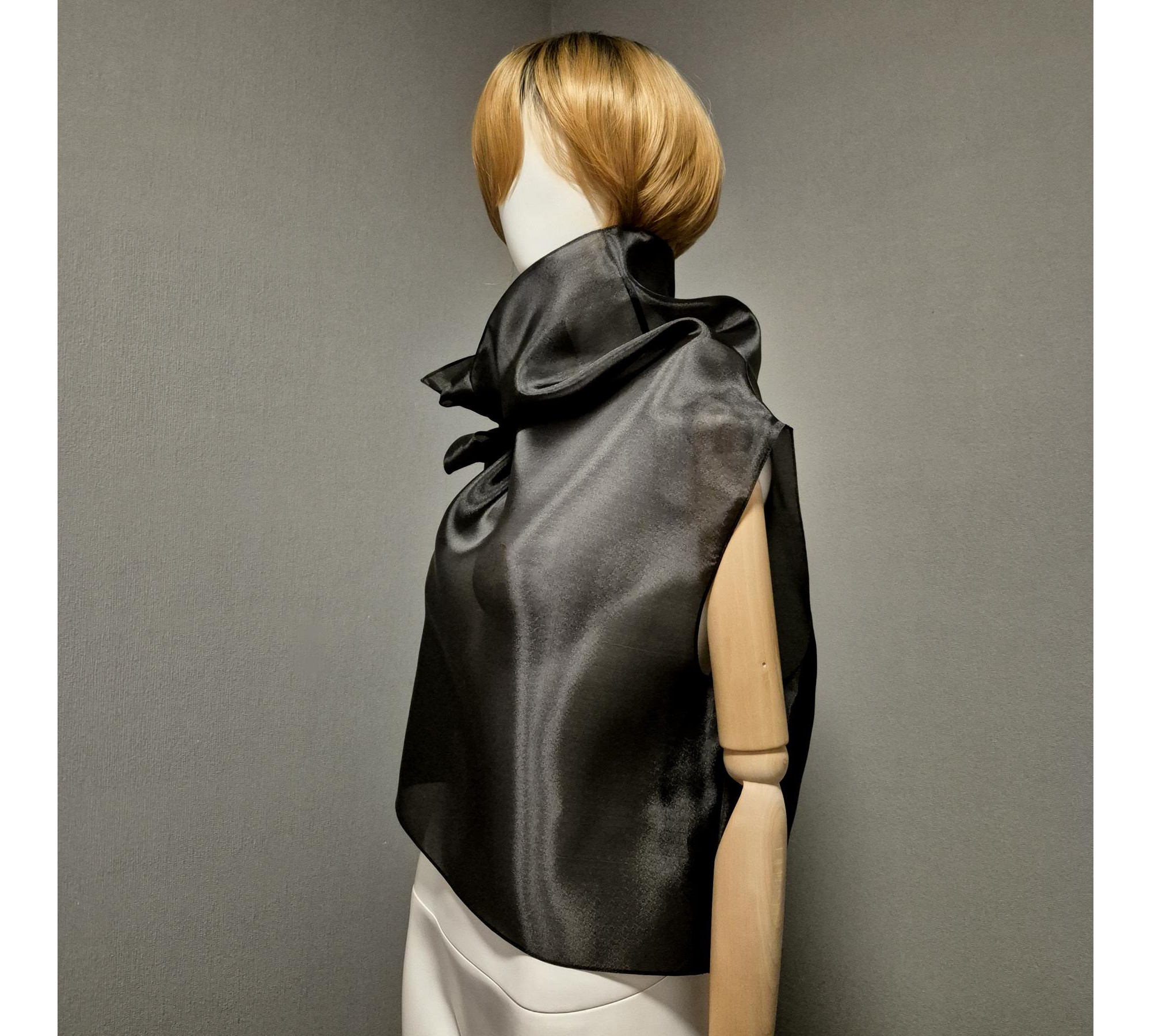 Black gothic style belted blouse a high neck, made of translucent organza.