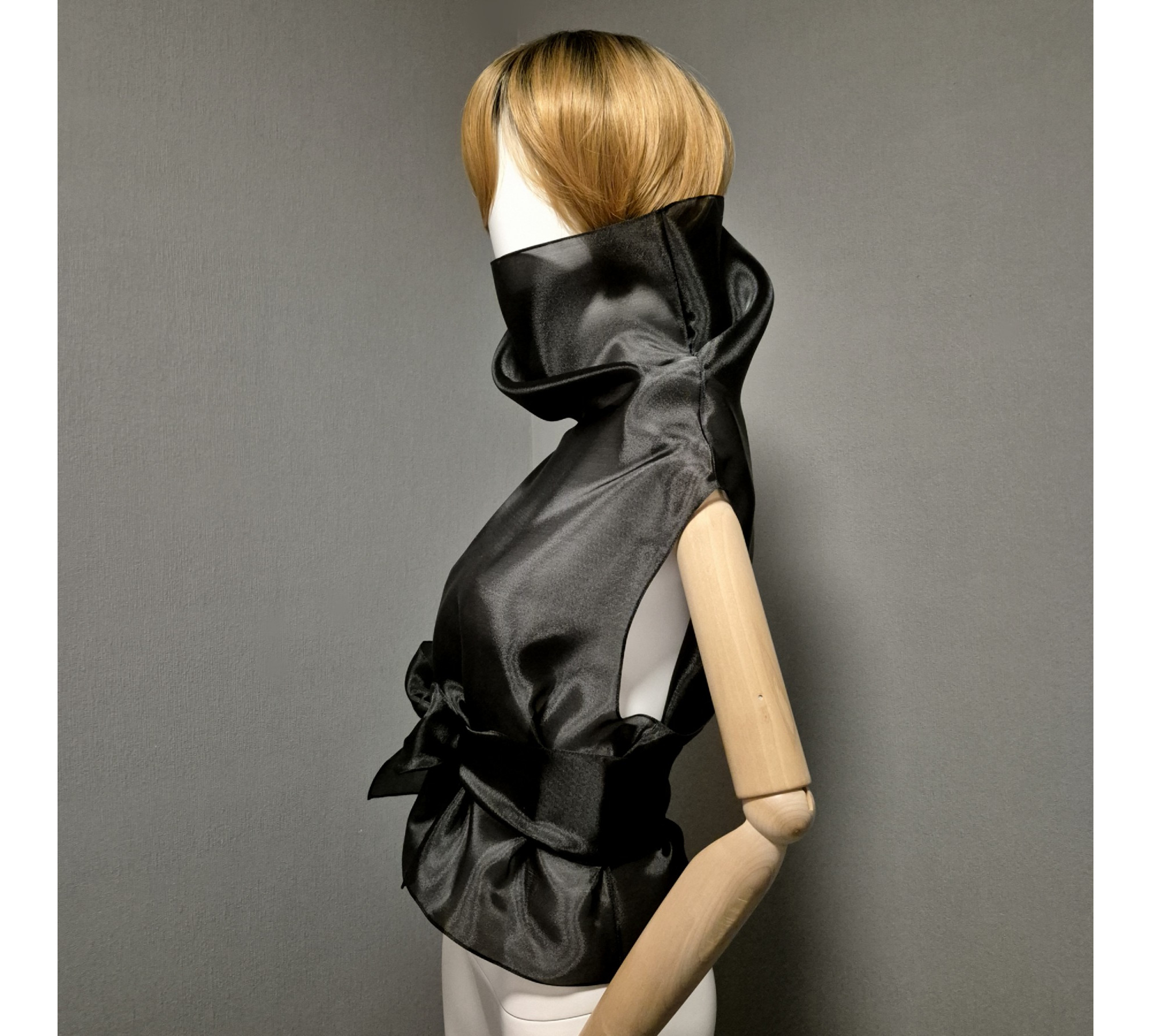 Black gothic style belted blouse a high neck, made of translucent organza.