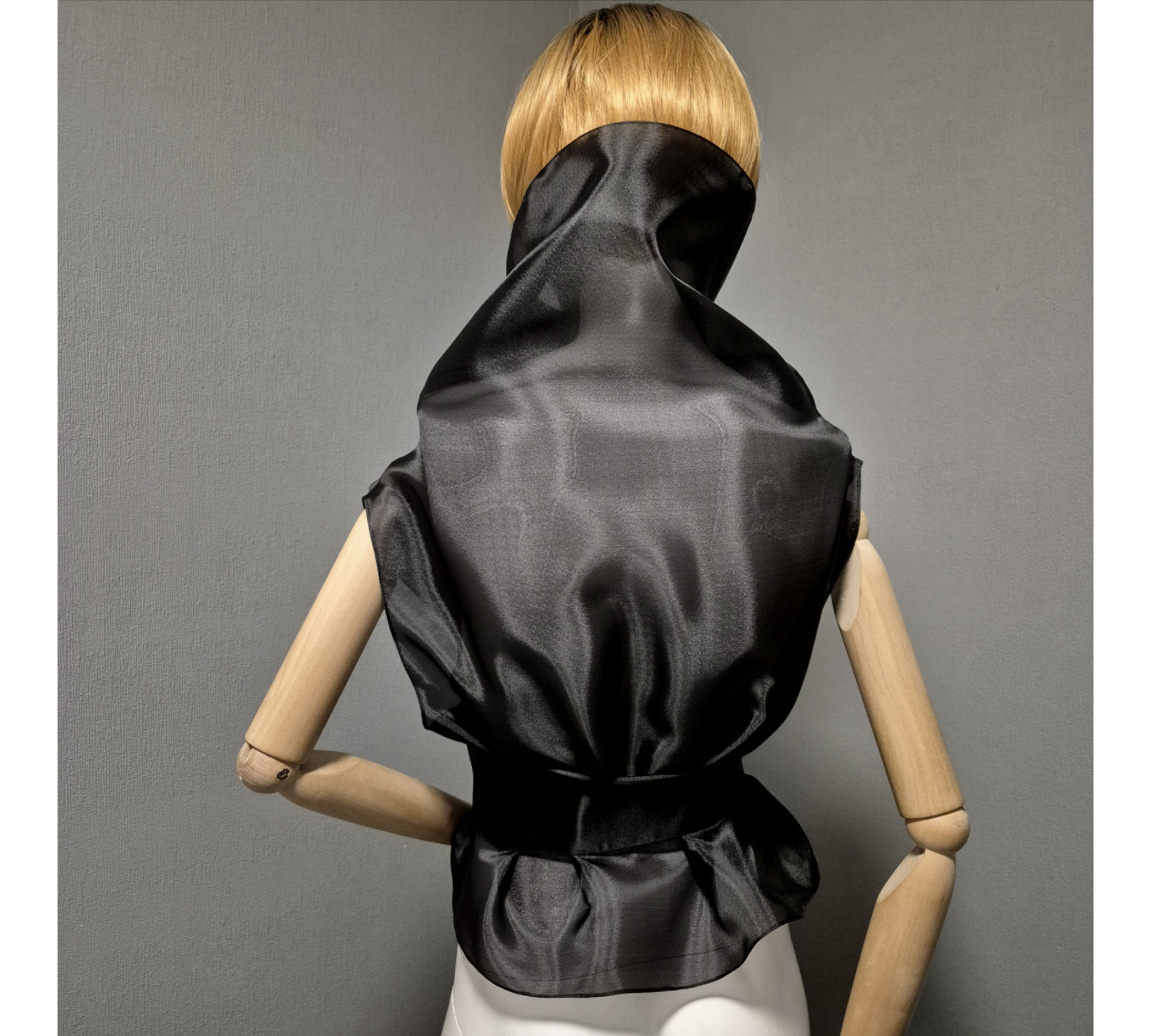 Black gothic style belted blouse a high neck, made of translucent organza.