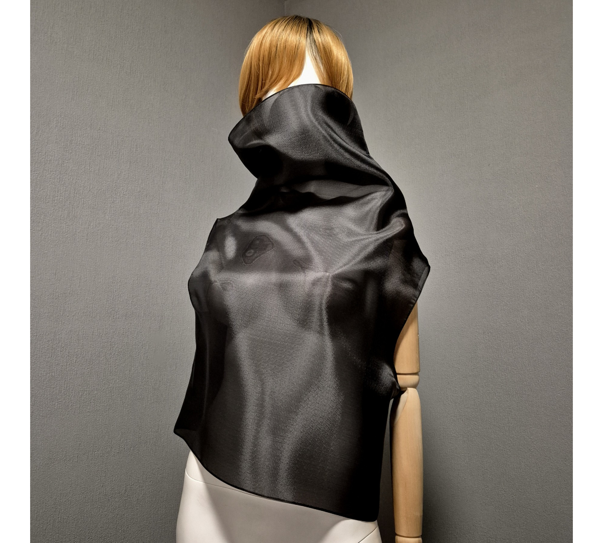 Black gothic style belted blouse a high neck, made of translucent organza.