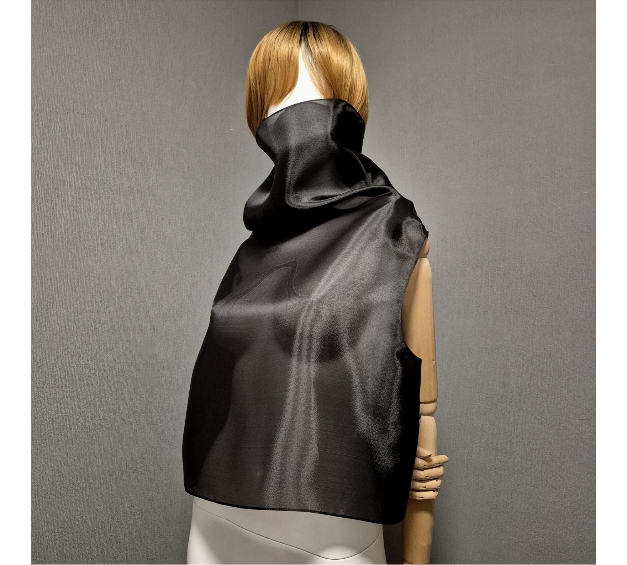 Black gothic style belted blouse a high neck, made of translucent organza.