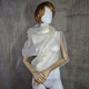 Beige asymmetrical blouse a high neck, made of translucent organza.