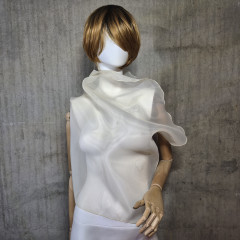 Beige sleeveless belted blouse a high neck.