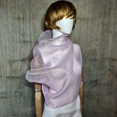 Pink sleeveless belted blouse a high neck.
