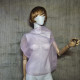 Pink asymmetrical blouse a high neck, made of translucent organza.