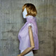 Pink asymmetrical blouse a high neck, made of translucent organza.