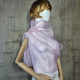 Pink asymmetrical blouse a high neck, made of translucent organza.