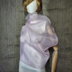 Pink asymmetrical blouse a high neck, made of translucent organza.