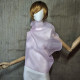 Pink asymmetrical blouse a high neck, made of translucent organza.