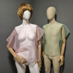 Transparent sleeveless blouse.